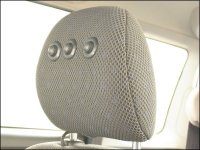 esempio di comandi ausiliari applicati al poggia testa