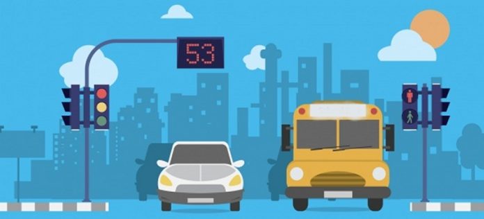 disegno di un semaforo al quale sono fermi un'automobile e un autobus